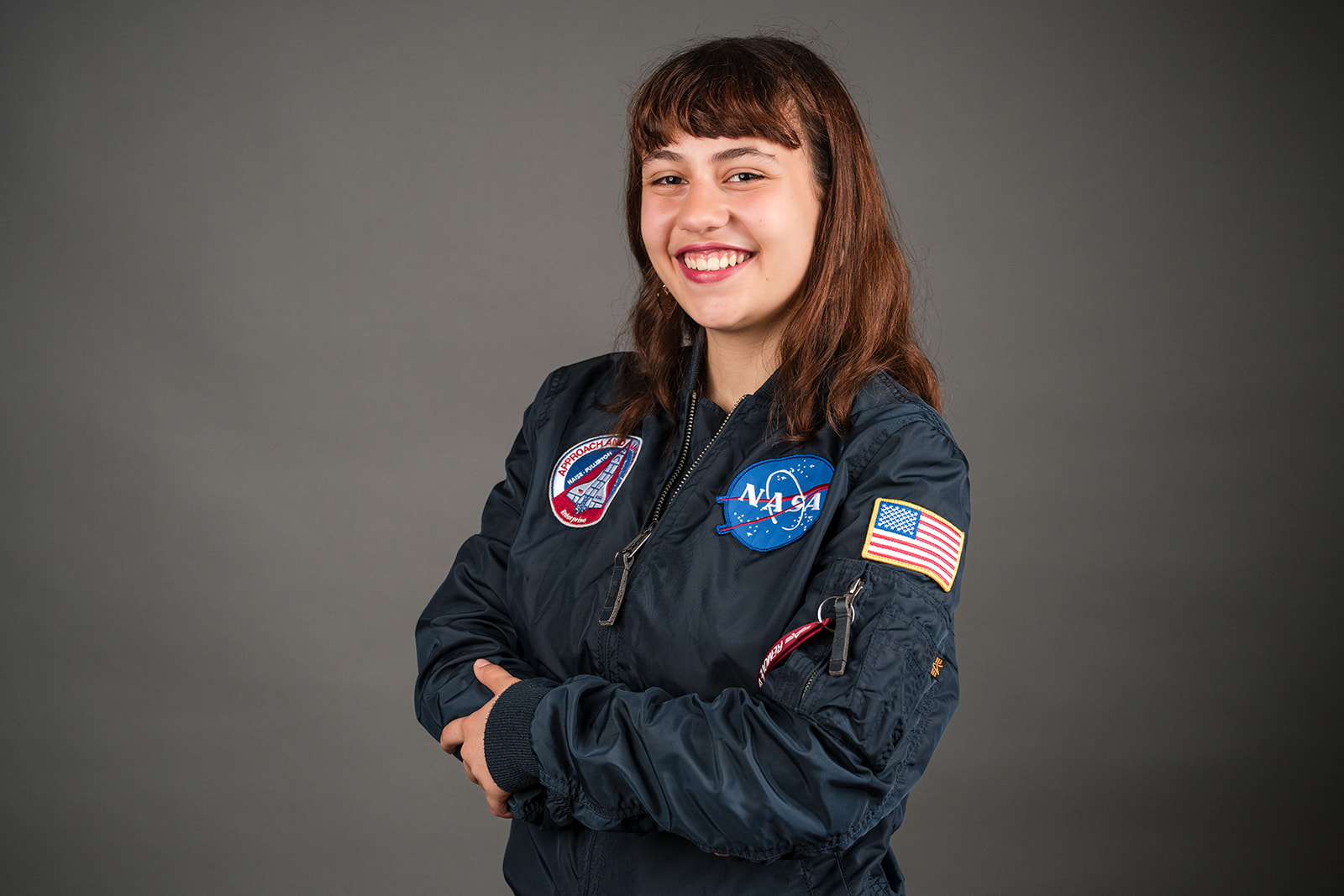 Marika Pescosolido wearing a NASA flight jacket